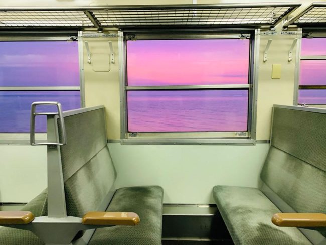 The sunset seen from the train window of the Aomori/JR Gono Line is a topic on SNS taken by tourists